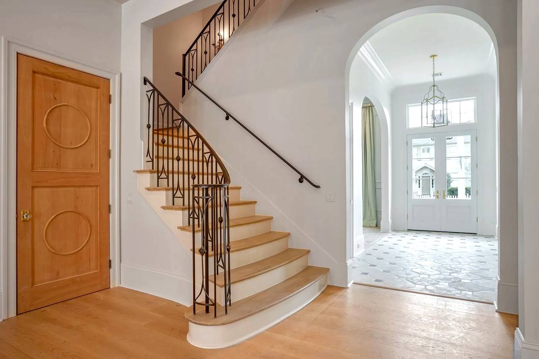 Iron balusters with scroll detail