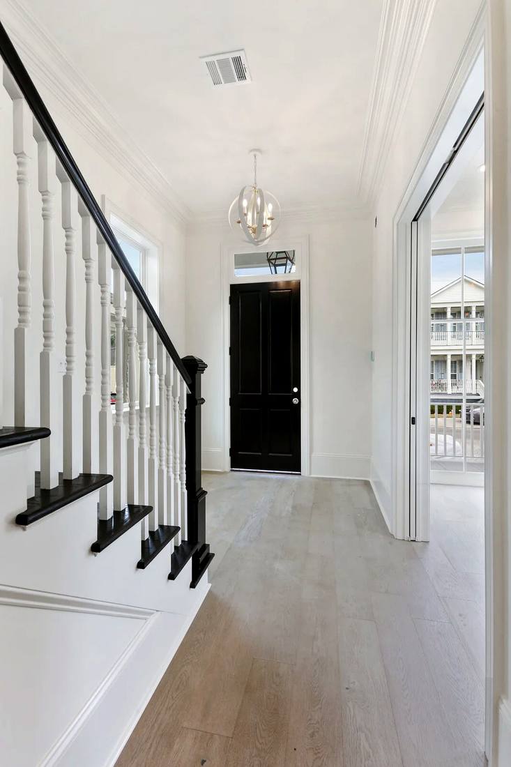 Classic white spindles with black newel