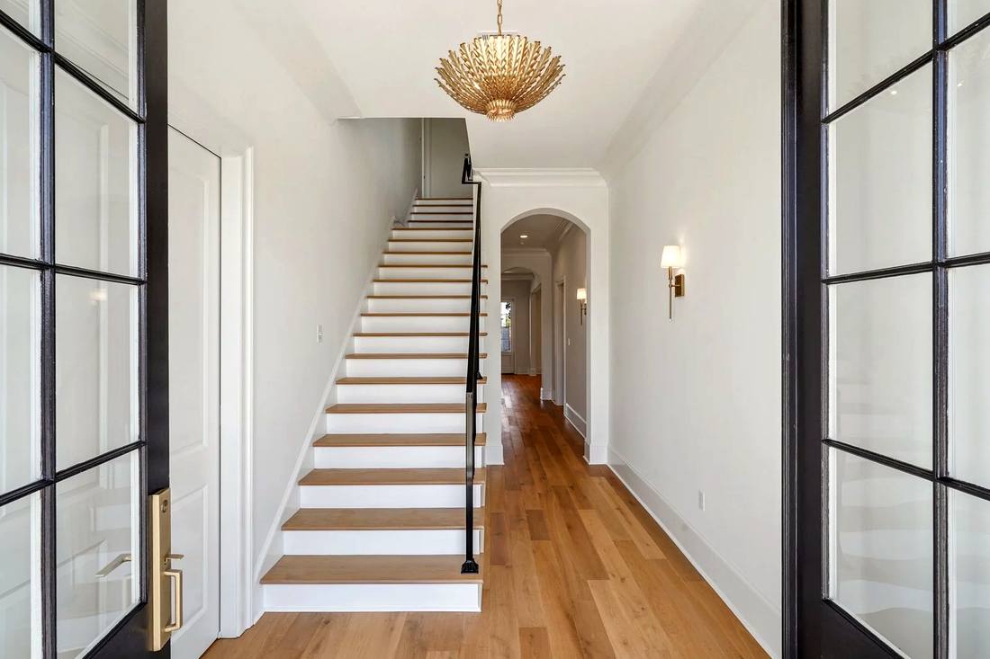 Wood treads with simple black balusters