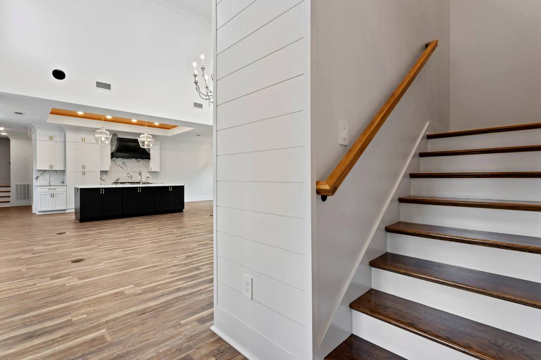 Stained wood treads with shiplap accent