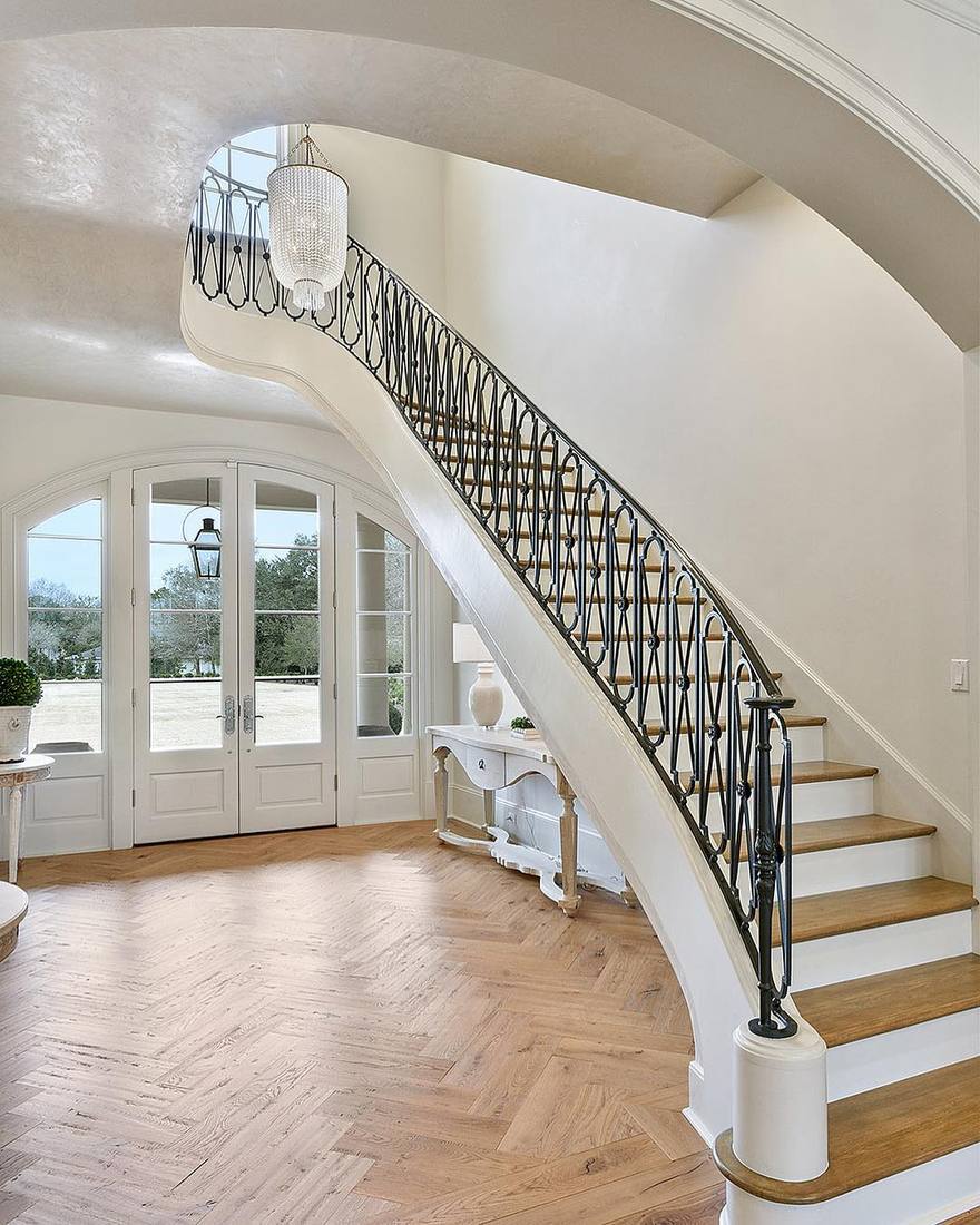 Ornate scrollwork balusters and marble floor